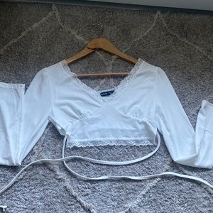White Shein top.  The size is an xs and has never been worn.
